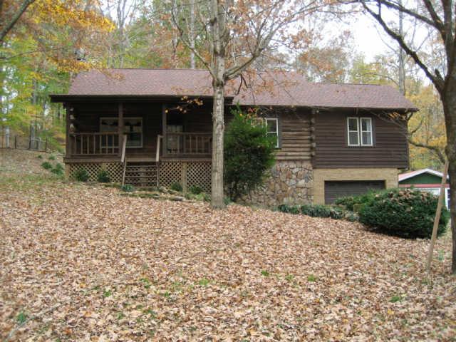 365 Double Branch Road Dickson, TN 37055 - Photo 1 of 20 a front view of a house with a garden