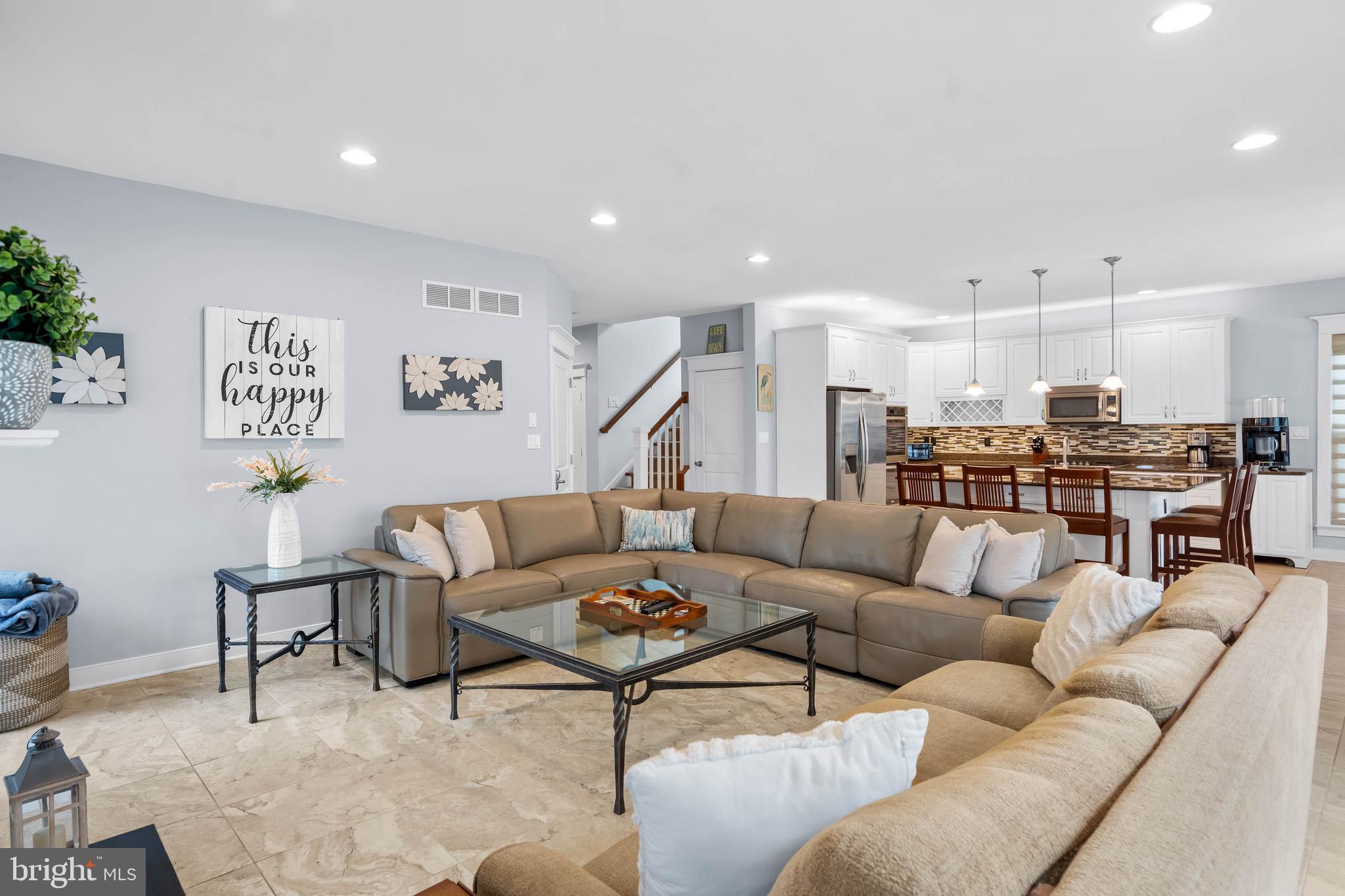 507 Jones Lane Rehoboth Beach, DE 19971 - Photo 14 of 62 a living room with furniture kitchen view and a table
