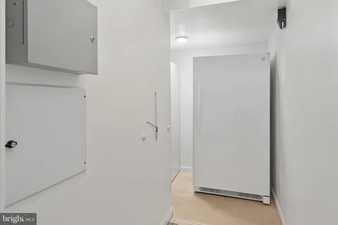 a view of staircase with wooden floor