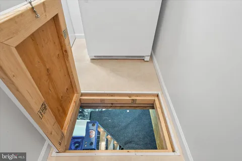 a bedroom with a large bed and a couch