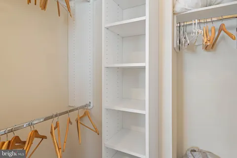 a view of an empty walk in closet