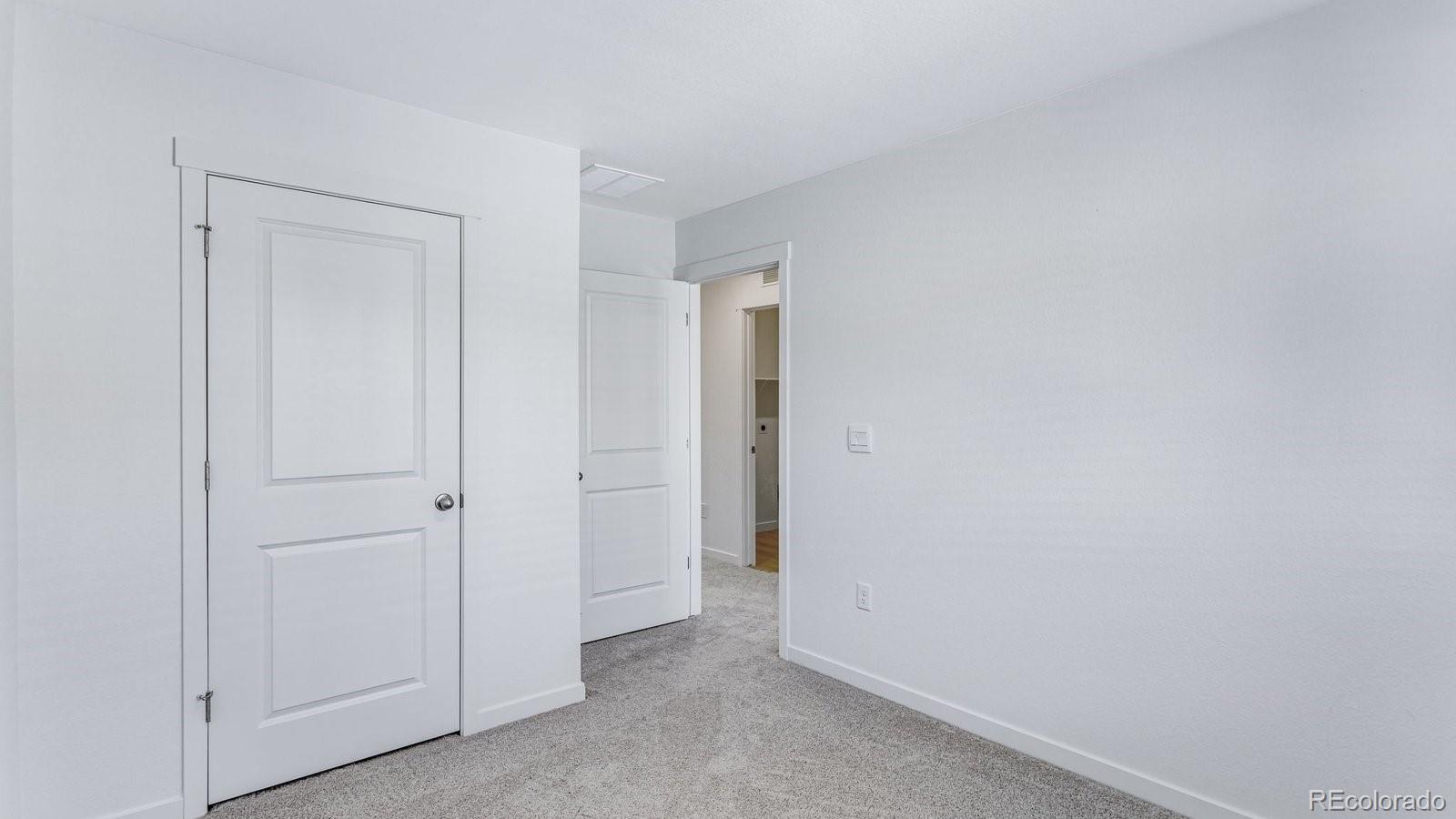 1358 South Chester Street, Unit B Denver, CO 80247 - Photo 32 of 42 a view of an empty room