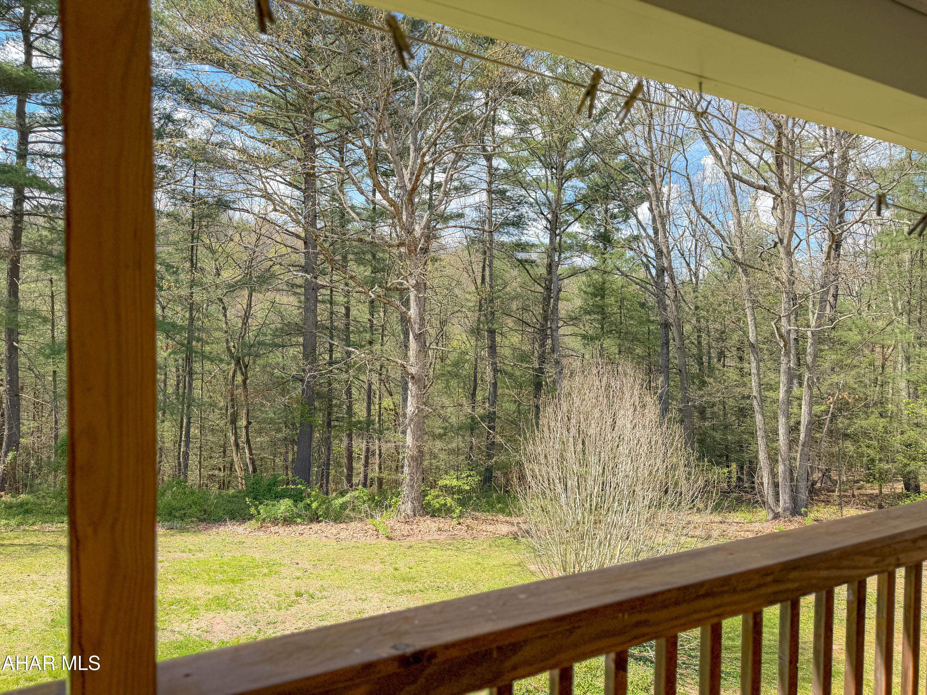 151 Pine Echo Road Everett, PA 15537 - Photo 15 of 51 a view of a yard from a balcony