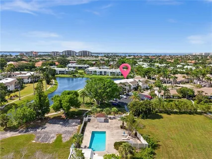 an aerial view of city and green space