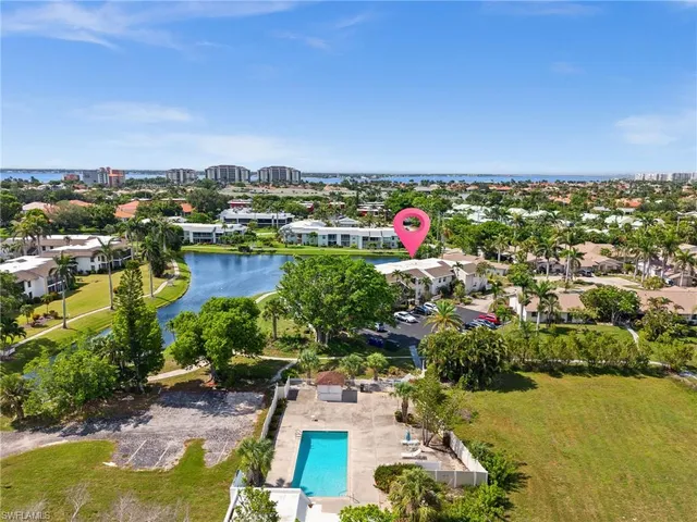 an aerial view of city and green space