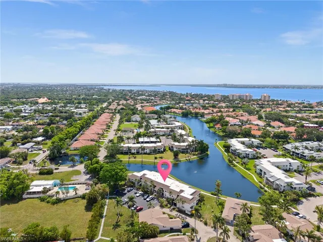 an aerial view of a houses with outdoor space