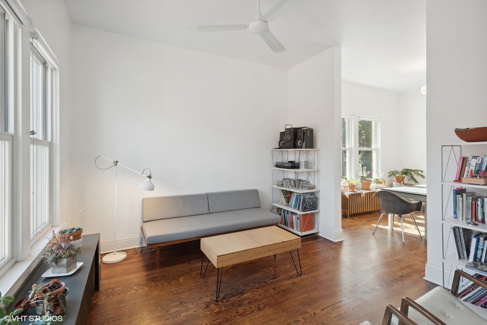 3238 South Green Street Chicago, IL 60608 - Photo 5 of 15 a living room with furniture and a wooden floor
