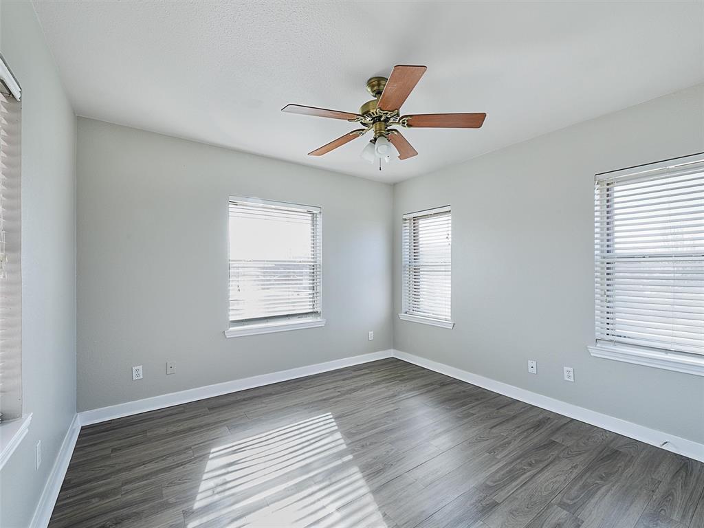 707 Doris Lane Gunter, TX 75058 - Photo 16 of 25 a view of a room window and wooden floor