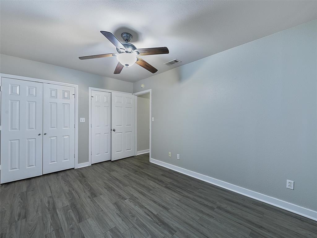707 Doris Lane Gunter, TX 75058 - Photo 22 of 25 a view of an empty room and wooden floor
