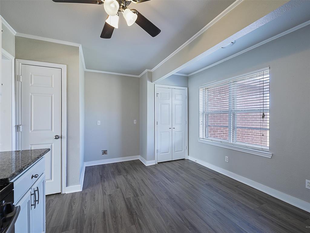 707 Doris Lane Gunter, TX 75058 - Photo 7 of 25 a view of an empty room with wooden floor and a window