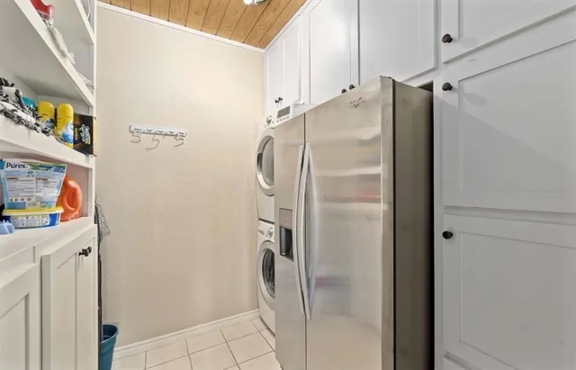 a bathroom with a shower and a glass door