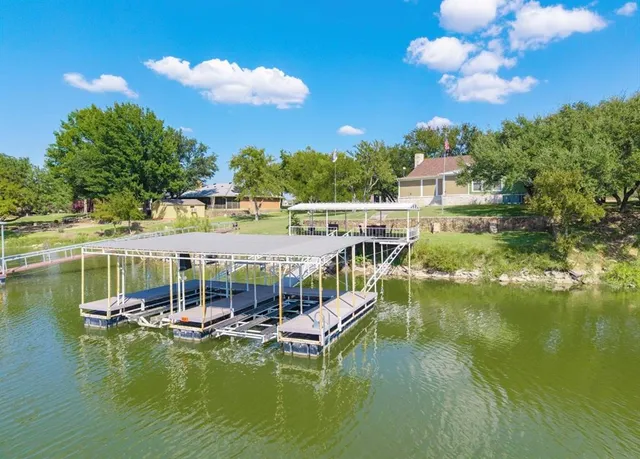 an aerial view of ocean residential house with outdoor space and river