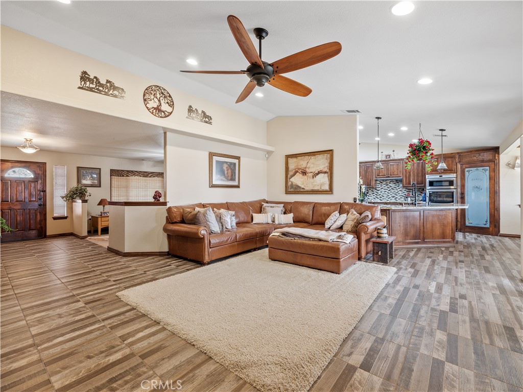 13991 Jicarilla Road Apple Valley, CA 92307 - Photo 14 of 44 a living room with furniture and a large window