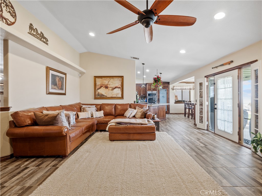 13991 Jicarilla Road Apple Valley, CA 92307 - Photo 19 of 44 a living room with furniture and a large window