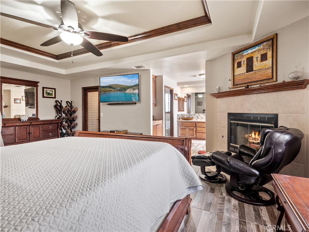 13991 Jicarilla Road Apple Valley, CA 92307 - Photo 26 of 44 a bedroom with a bed a couch and dresser