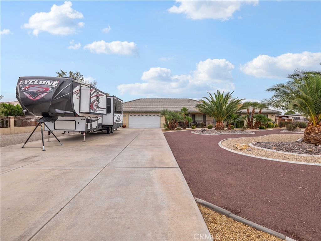 13991 Jicarilla Road Apple Valley, CA 92307 - Photo 32 of 44 a view of a terrace with sitting area