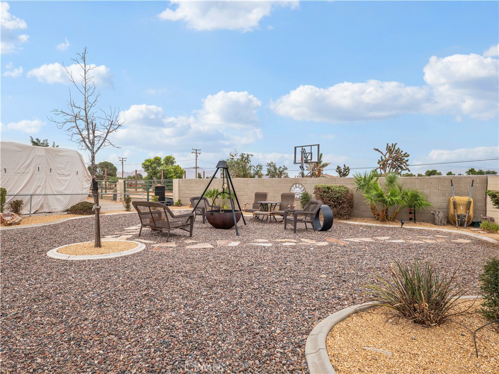 13991 Jicarilla Road Apple Valley, CA 92307 - Photo 37 of 44 a view of a house with a park