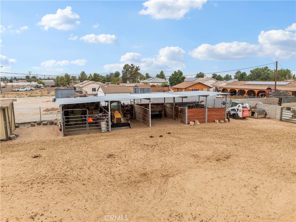 13991 Jicarilla Road Apple Valley, CA 92307 - Photo 8 of 44 a view of a house with outdoor space and sitting area