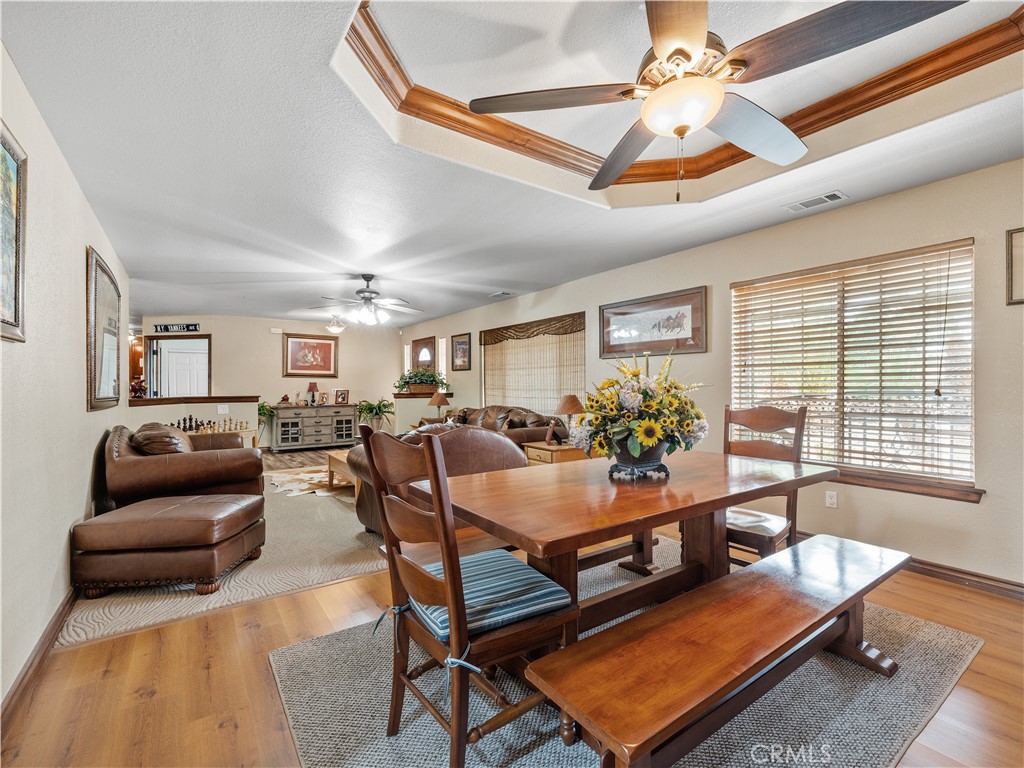 13991 Jicarilla Road Apple Valley, CA 92307 - Photo 10 of 44 a living room with furniture and a chandelier