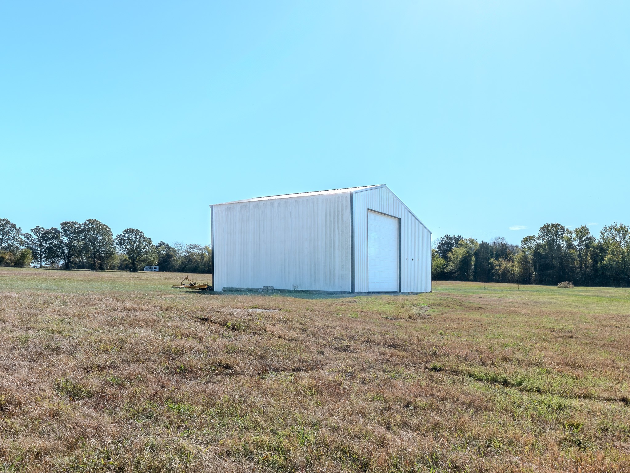 538 Mt Vernon Road Eagleville, TN 37060 - Photo 15 of 34 a view of a field with an trees in the background