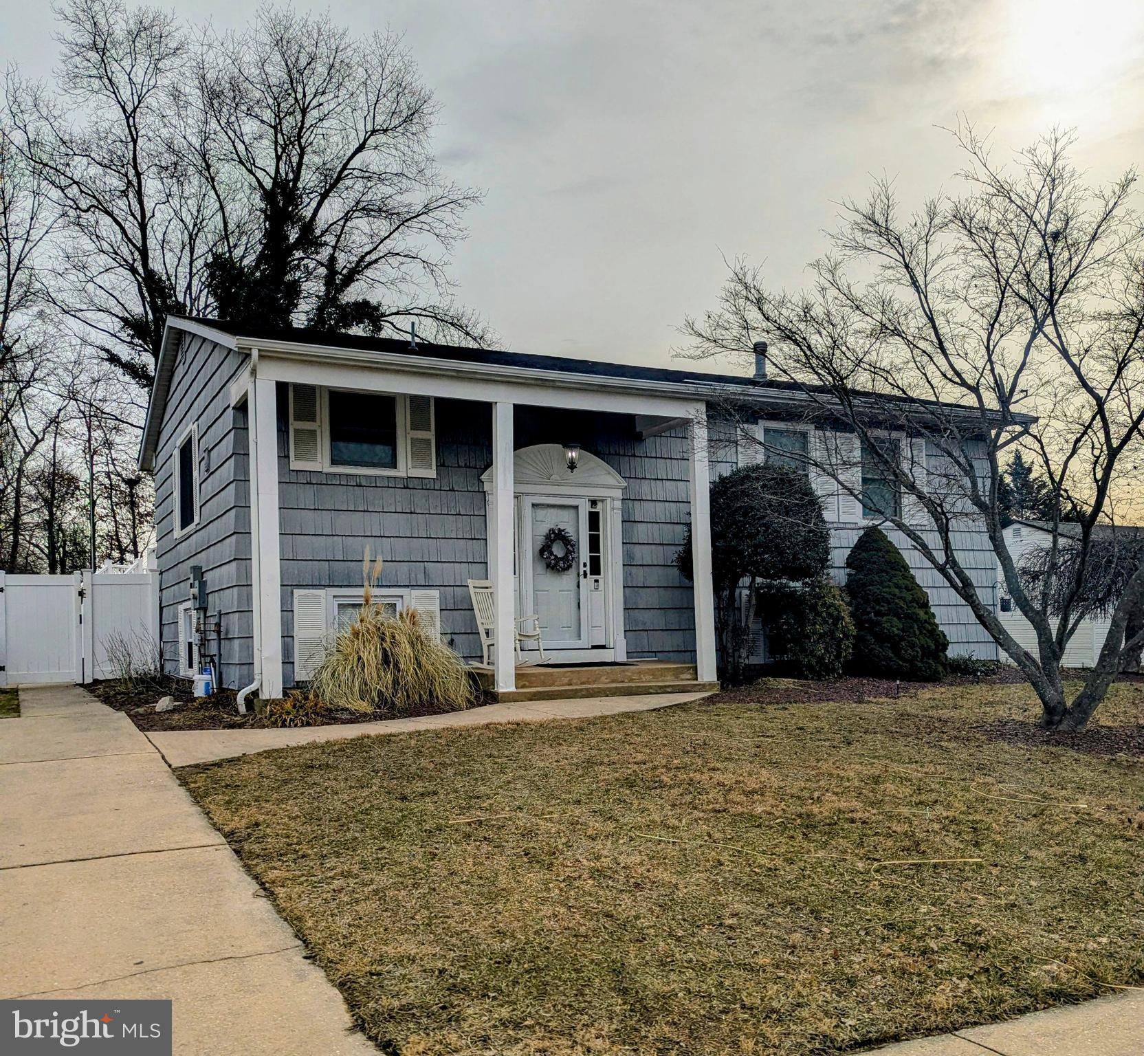a front view of a house with yard