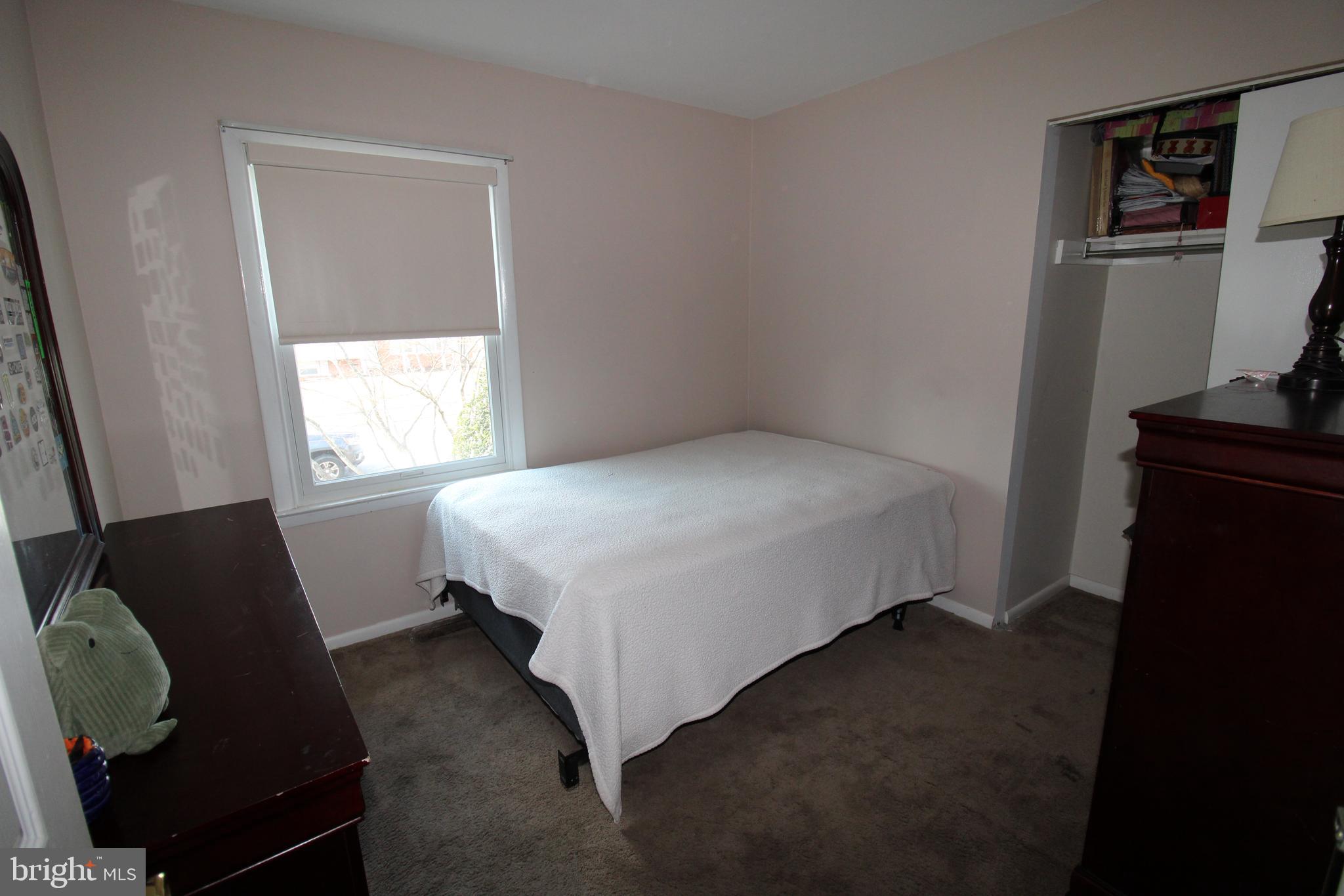31 Northfield Road Newark, DE 19713 - Photo 20 of 54 a bedroom with a bed and a window