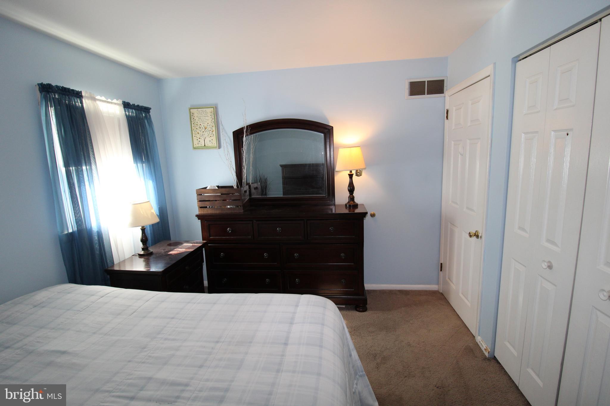 31 Northfield Road Newark, DE 19713 - Photo 28 of 54 a bedroom with a bed and a dresser