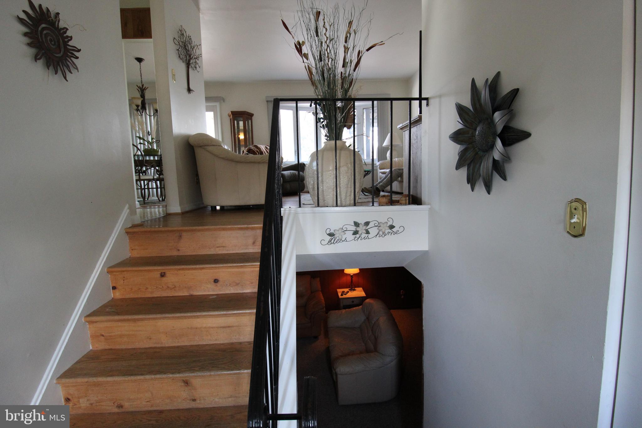31 Northfield Road Newark, DE 19713 - Photo 3 of 54 a view of entryway and hall with wooden floor
