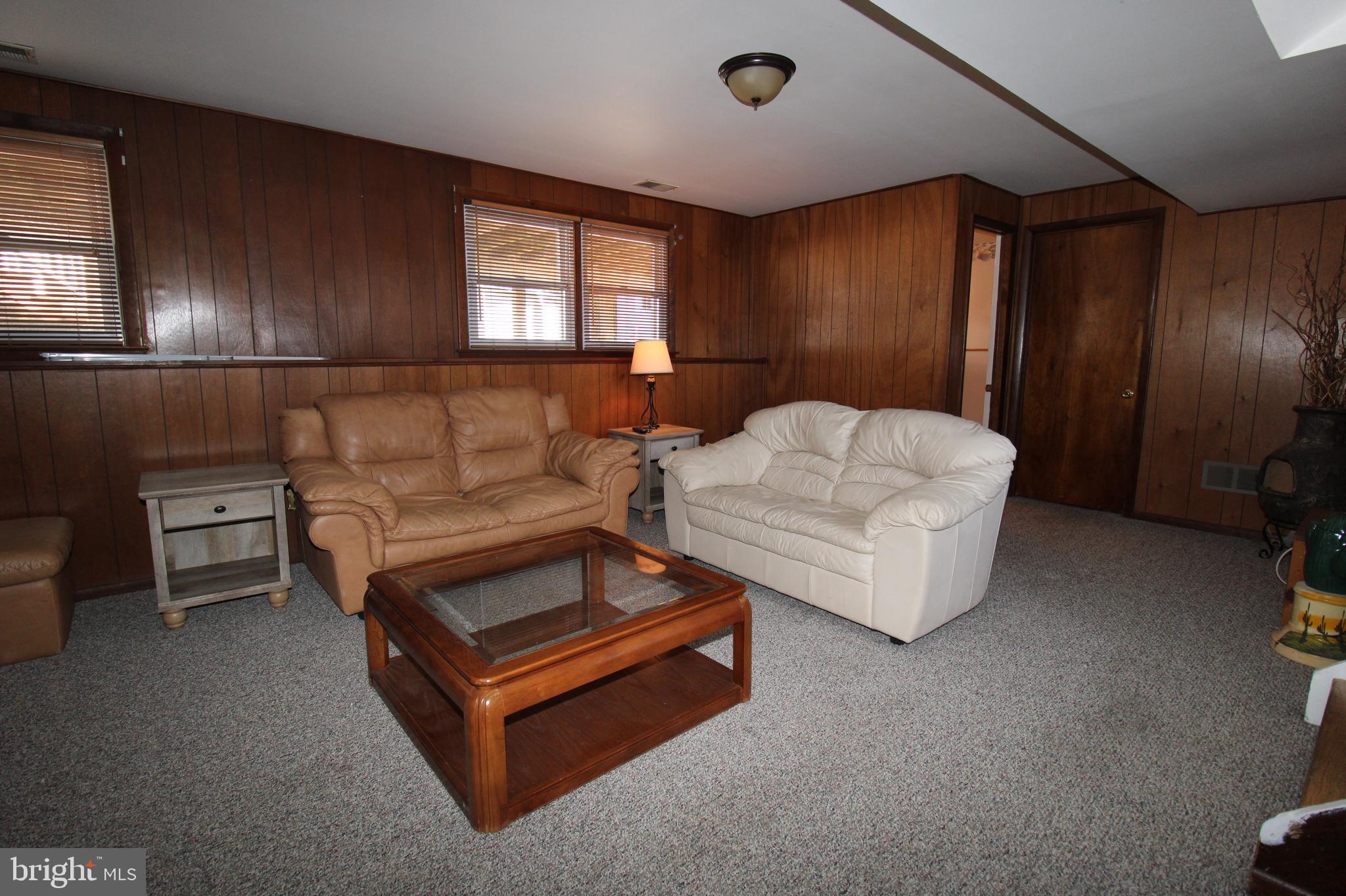 31 Northfield Road Newark, DE 19713 - Photo 36 of 54 a living room with furniture and a window