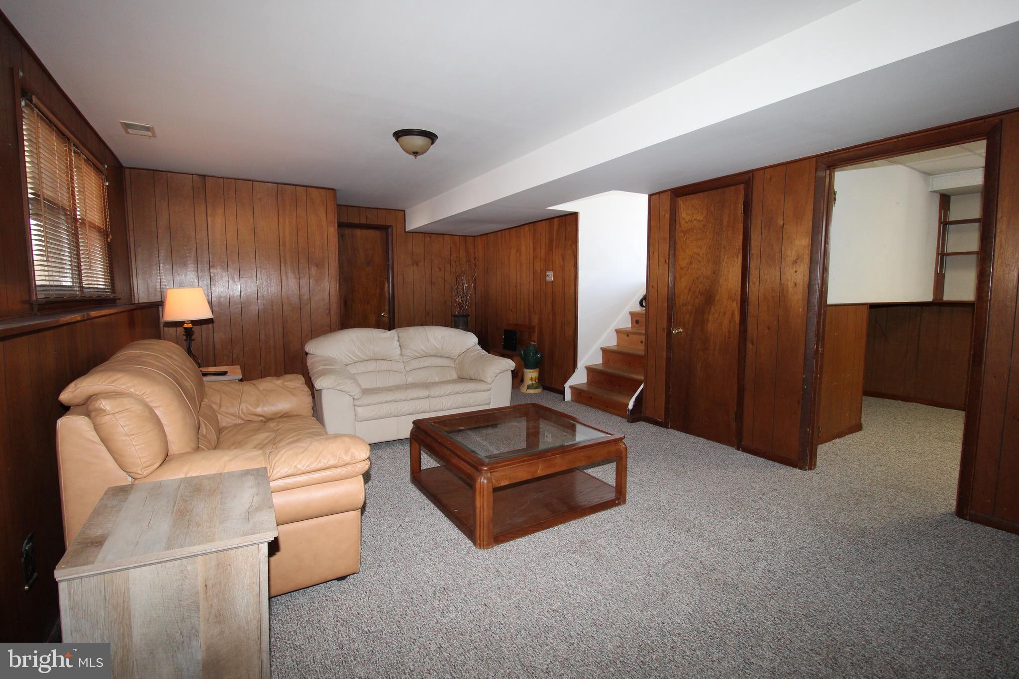 31 Northfield Road Newark, DE 19713 - Photo 38 of 54 a living room with furniture and a window