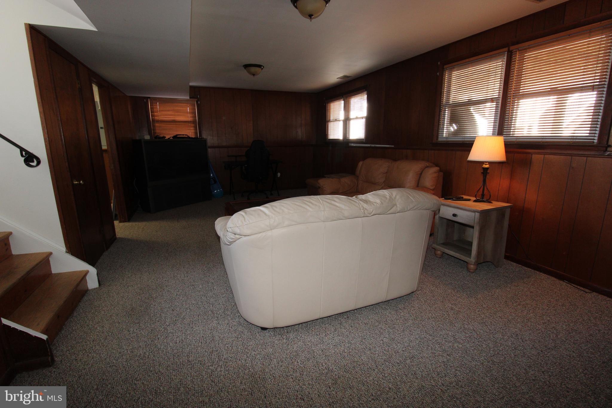 31 Northfield Road Newark, DE 19713 - Photo 44 of 54 a living room with furniture and a window