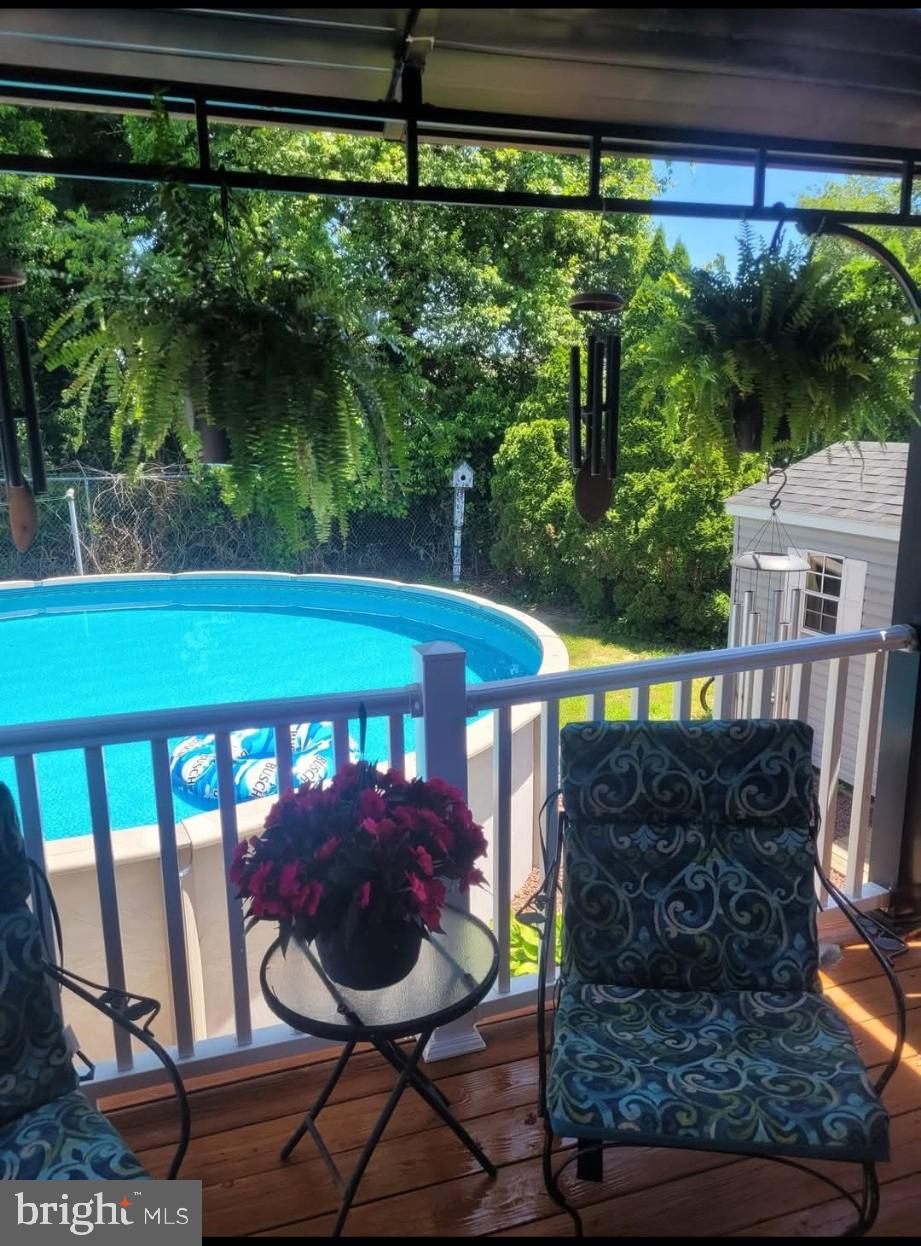 31 Northfield Road Newark, DE 19713 - Photo 48 of 54 a view of a chairs and table in the patio