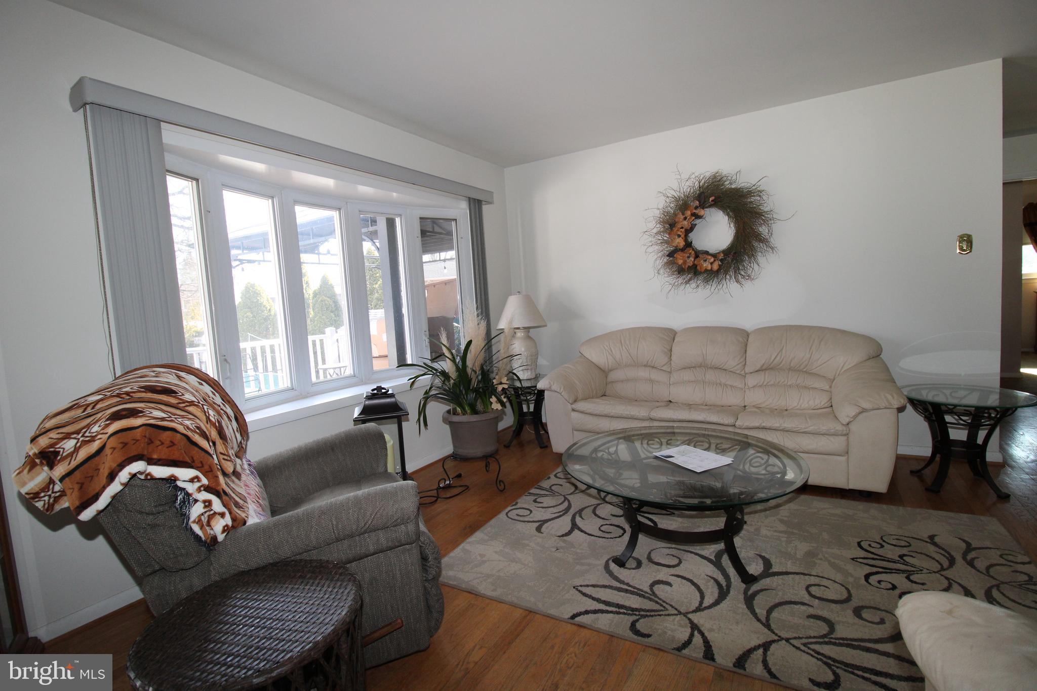 31 Northfield Road Newark, DE 19713 - Photo 8 of 54 a living room with furniture and a large window