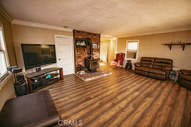 6701 Gaylord Street Riverside, CA 92505 - Photo 12 of 25 a living room with furniture and a flat screen tv