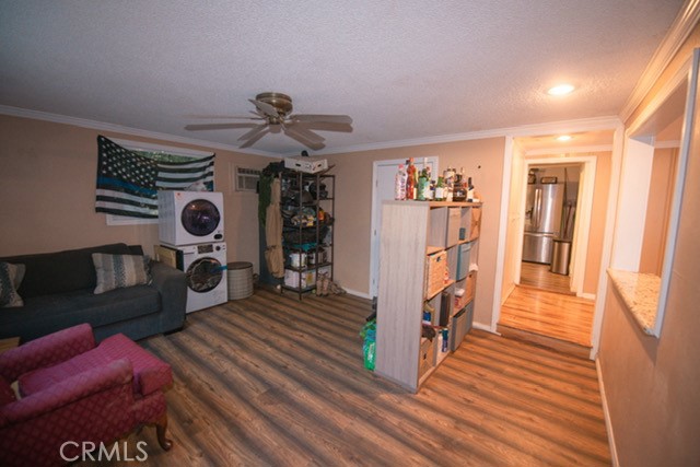 6701 Gaylord Street Riverside, CA 92505 - Photo 17 of 25 a view of entryway livingroom and hall with wooden floor
