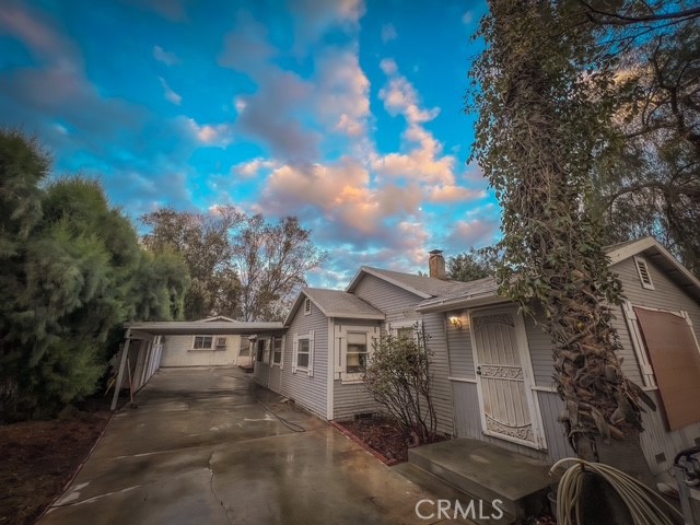 6701 Gaylord Street Riverside, CA 92505 - Photo 2 of 25 a front view of a house with a yard