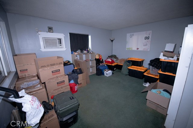 6701 Gaylord Street Riverside, CA 92505 - Photo 22 of 25 a living room with furniture and a flat screen tv