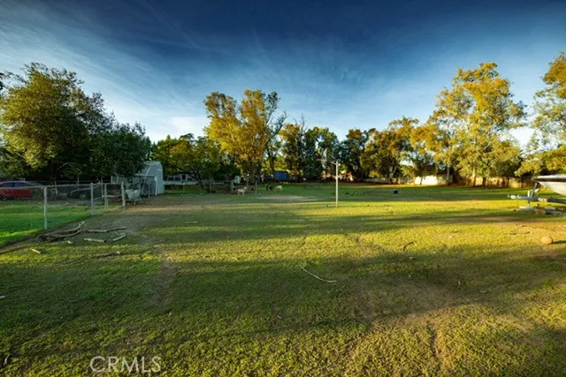 a view of a golf course with a lake view