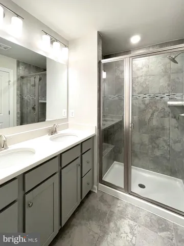 a view of a hallway with closet and entryway