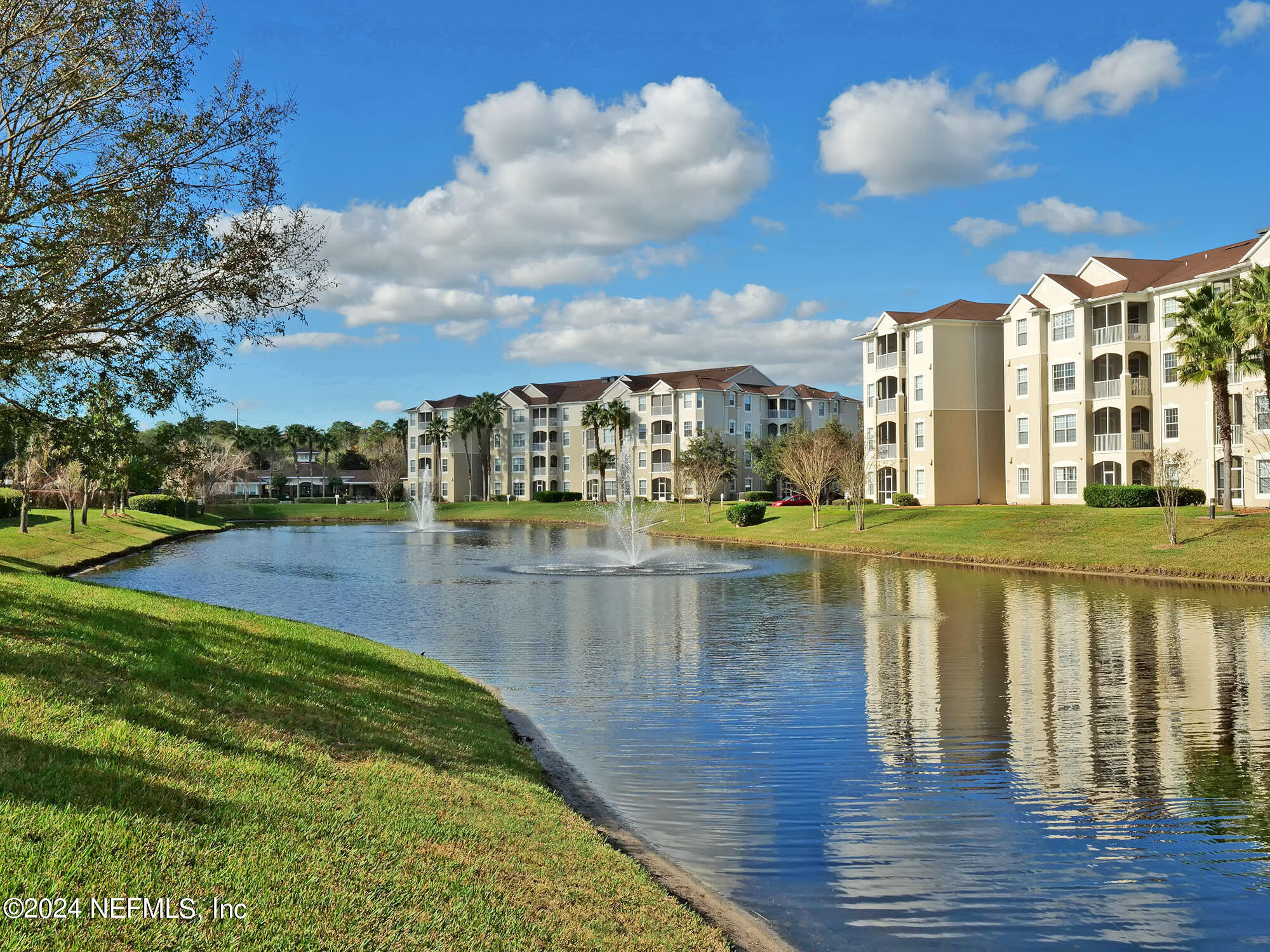 7801 Point Meadows Drive, Unit 5202 Jacksonville, FL 32256 - Photo 30 of 34 a view of swimming pool with outdoor seating and city view