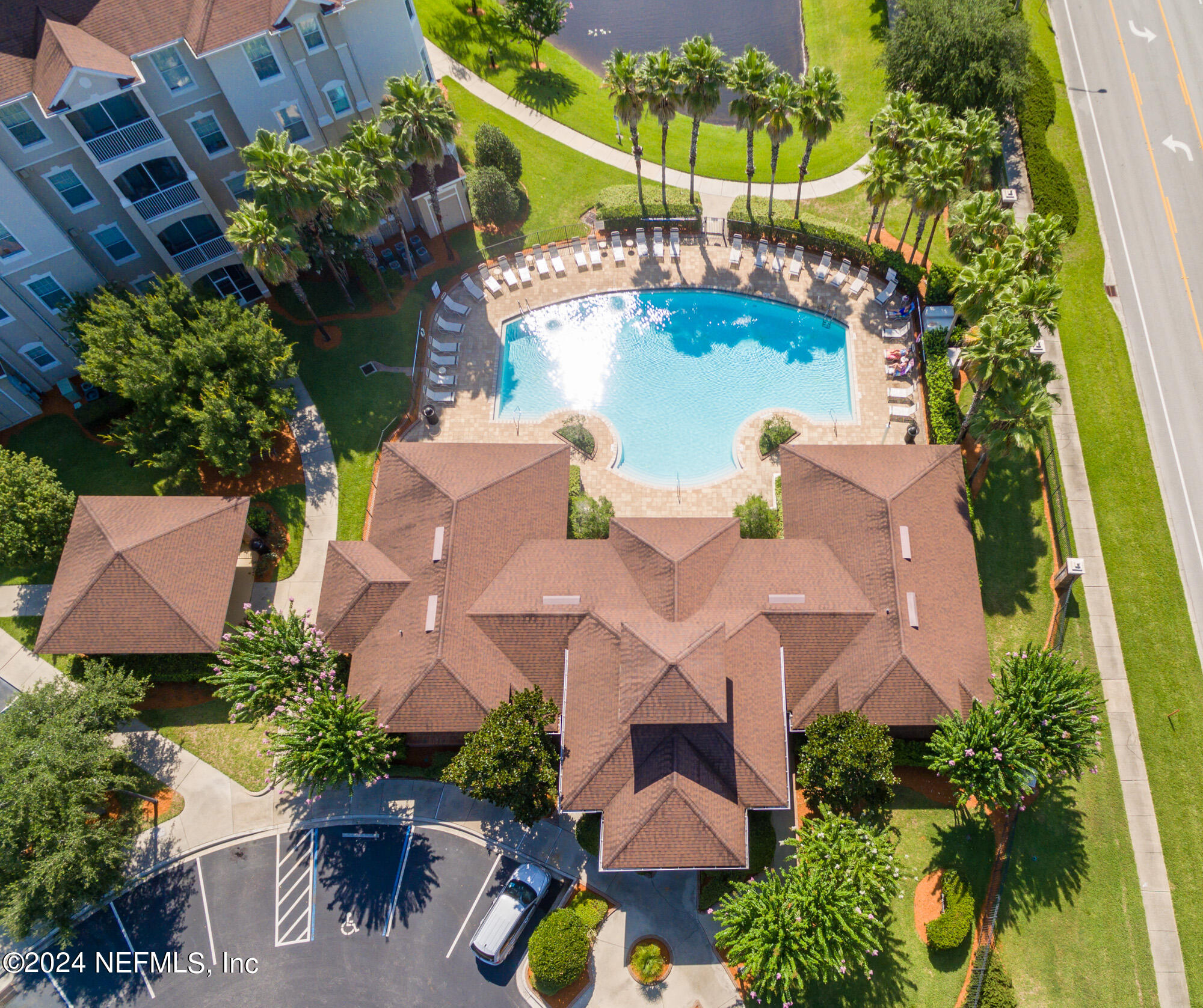 7801 Point Meadows Drive, Unit 5202 Jacksonville, FL 32256 - Photo 3 of 34 an aerial view of house with yard swimming pool and outdoor seating