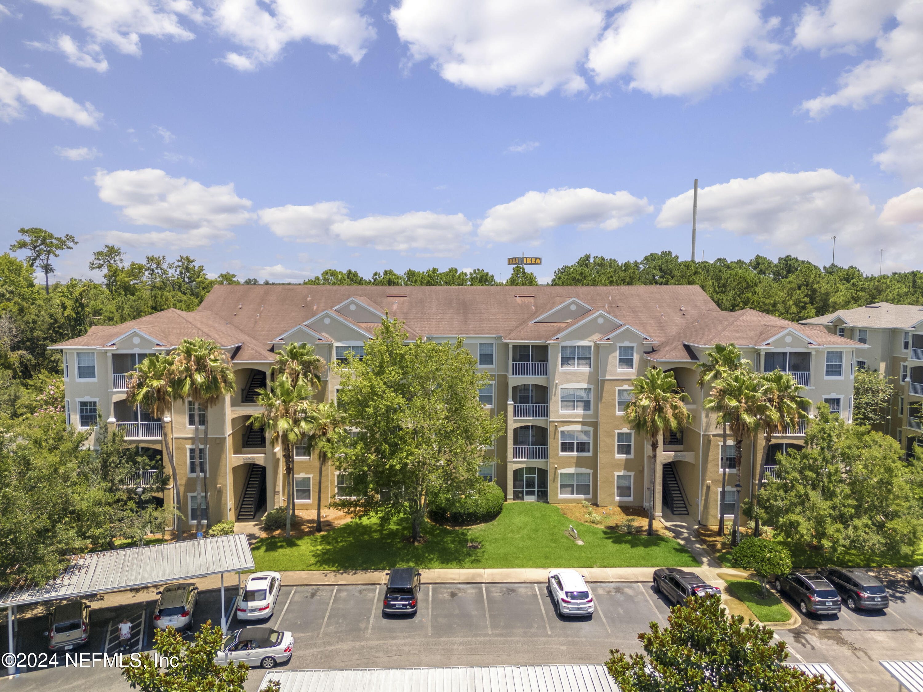 7801 Point Meadows Drive, Unit 5202 Jacksonville, FL 32256 - Photo 7 of 34 a view of a city with tall buildings