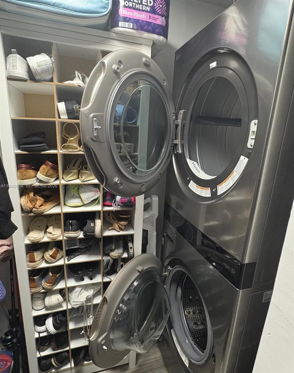 60 Southwest 13th Street, Unit 3013 Miami, FL 33130 - Photo 12 of 26 a utility room with dryer and washer