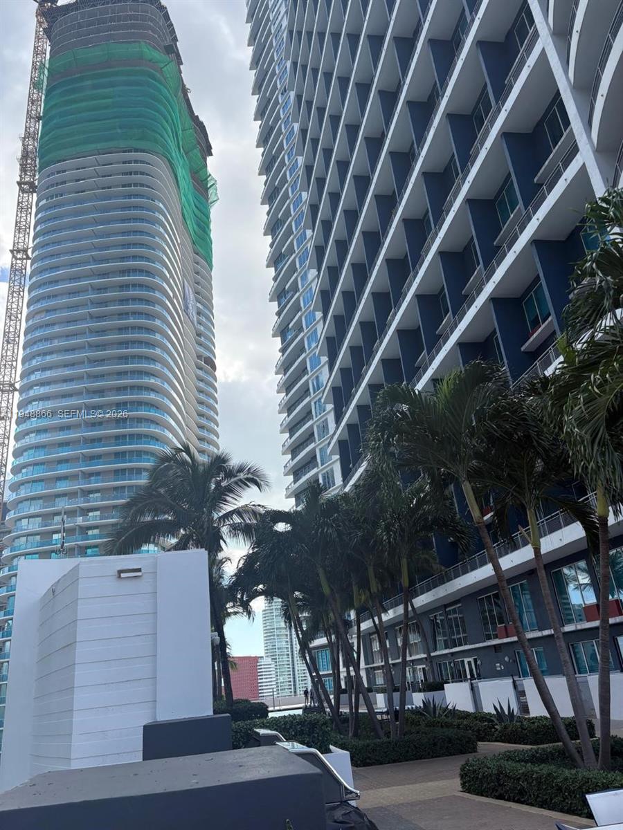 60 Southwest 13th Street, Unit 3013 Miami, FL 33130 - Photo 23 of 26 a view of building along with street