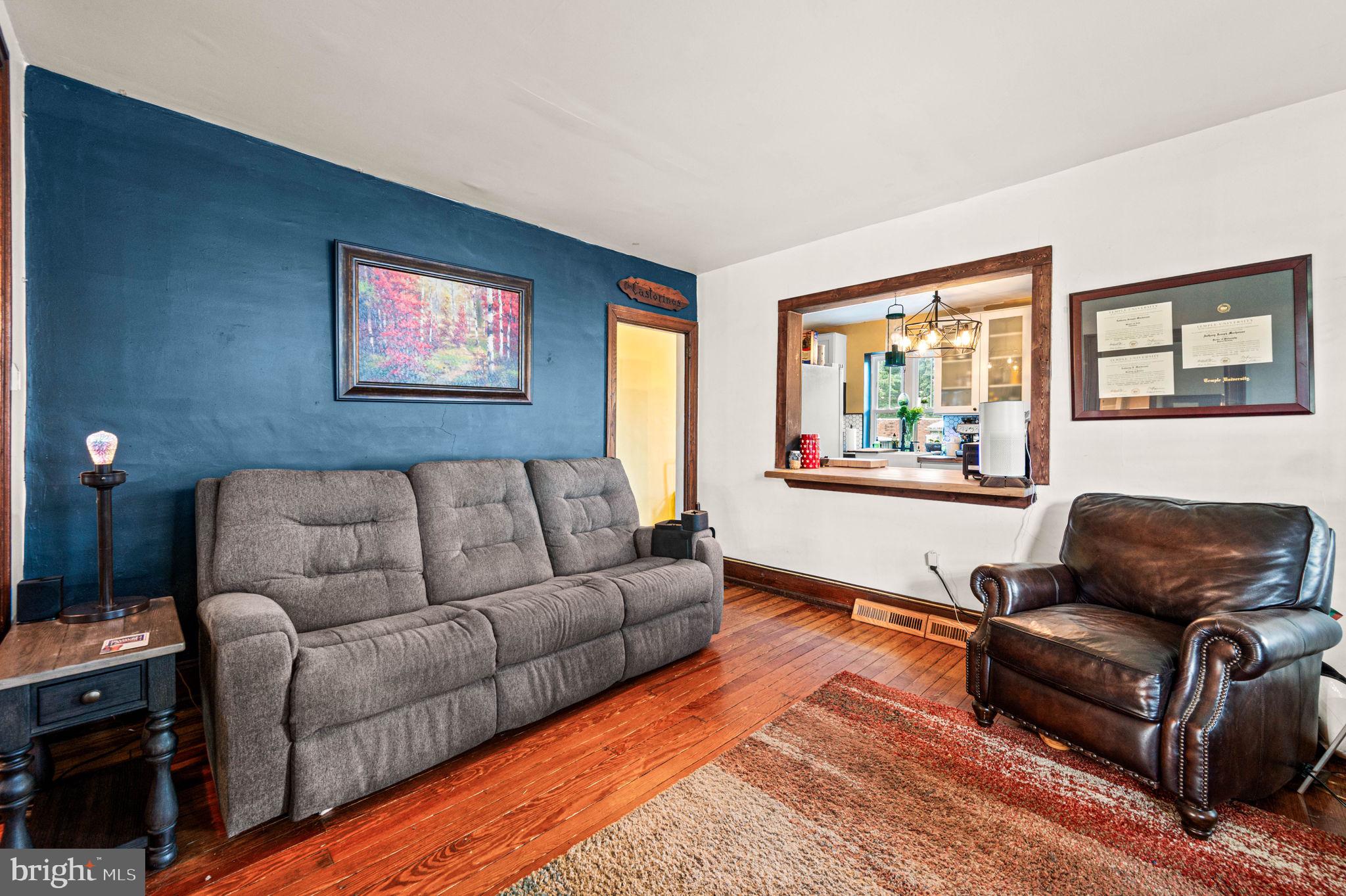 3 Township Line Road Elkins Park, PA 19027 - Photo 11 of 40 Cozy living space with vibrant accents.