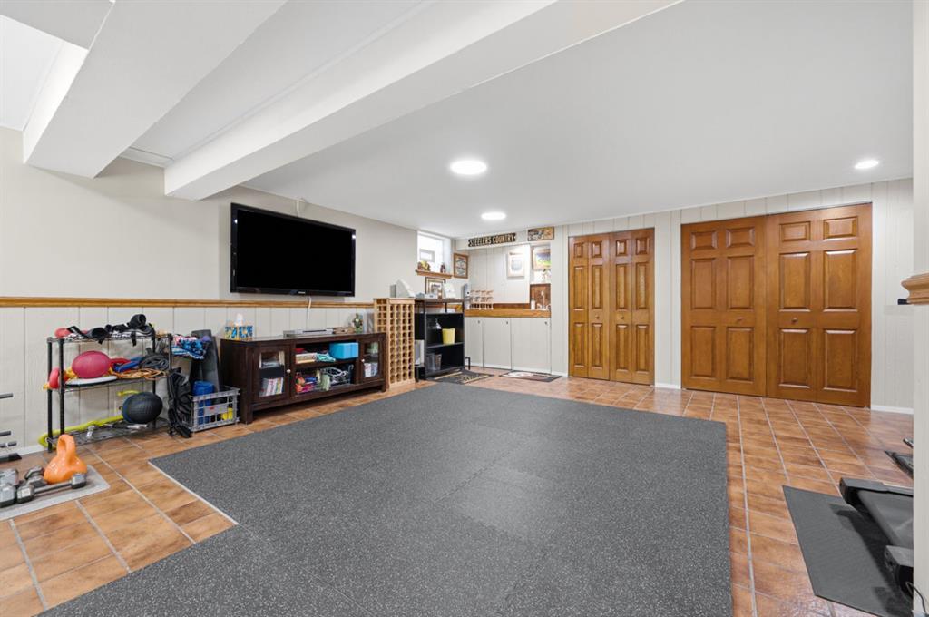 1820 Kent Road Pittsburgh, PA 15241 - Photo 34 of 50 Wet bar and a wall of storage in the finished basement.