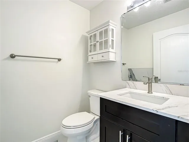 a view of a storage & utility room with a sink