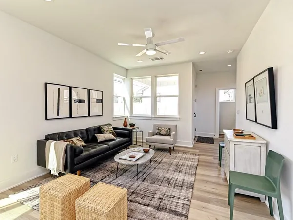 a living room with furniture or couch and a window