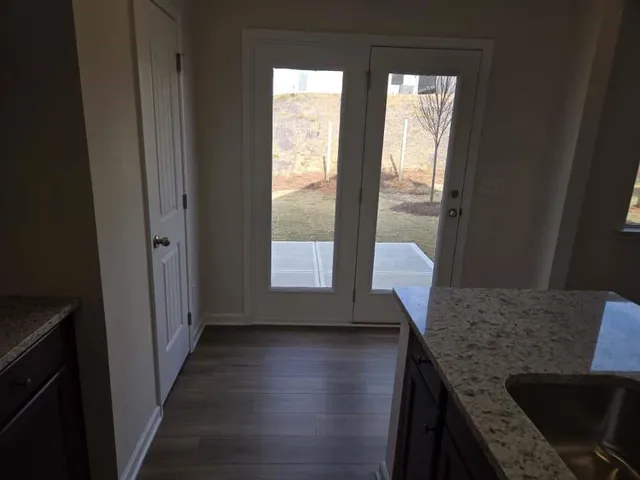 an empty room with windows