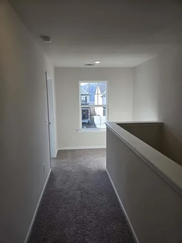 a bathroom with a sink a toilet and a shower